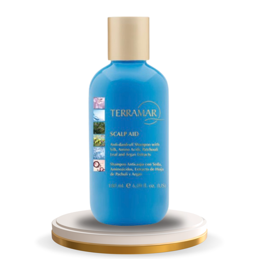 SCALP AID
SHAMPOO ANTICASPA
con Seda, Aminoácidos,
Extracto de Hoja de Pachuli y Argán